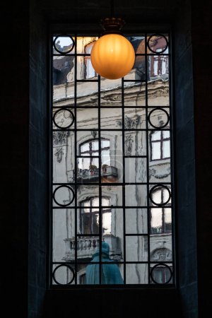 Photo for Copenhagen, Denmark A window and lamp in the  Frederiks Church, or Marble Church. - Royalty Free Image