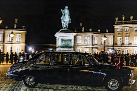 Photo for Copenhagen, Denmark Frederik, Crown Prince of Denmark, and his wife Mary, Crown Princess of Denmark, arrive by car to an official event at Amalienborg Palace. - Royalty Free Image
