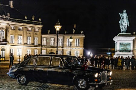 Photo for Copenhagen, Denmark Frederik, Crown Prince of Denmark, and his wife Mary, Crown Princess of Denmark, arrive by car to an official event at Amalienborg Palace. - Royalty Free Image