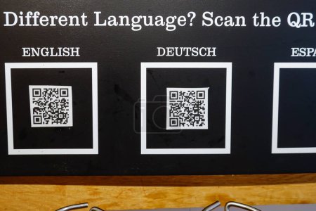 Photo for Delf, Netherlands  A QR code in a restaurant offers up menus in English  German and Spanish. - Royalty Free Image