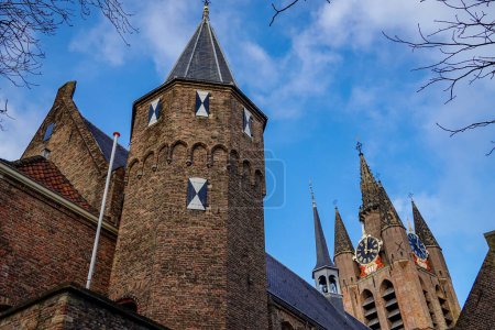 Photo for Delf, Netherlands A view of the leaning Oude Kerk, old church, in the old town. - Royalty Free Image