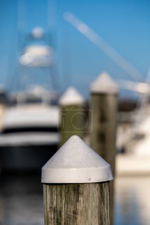 Foto de Solomons, Maryland ,USA White- topped pylons in a marina on the Patuxent River. - Imagen libre de derechos