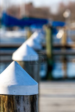 Foto de Solomons, Maryland ,USA White- topped pylons in a marina on the Patuxent River. - Imagen libre de derechos