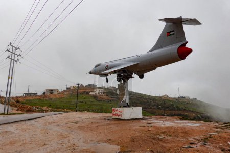Photo for Ajloun, Jordan A Lockheed F-104 Starfighter jet on a pedestal on the  road to Jarash. - Royalty Free Image