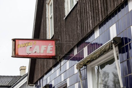 Photo for Billinge, Sweden An old antique sign over a closed bakeshop and cafe. - Royalty Free Image
