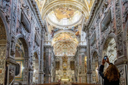 Photo for Palermo, Sicily, Italy, A tourist inside the ornate interior of the Chiesa di Santa Caterina d'Alessandria, Sain - Royalty Free Image