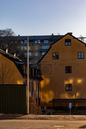 Stockholm, Sweden  An orange house facade in the Kungsholmen district on the corner of Pontonjargatan and Pilgatan.