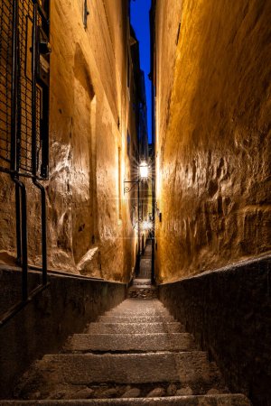 Stockholm, Sweden A view of the   city's narrowest alley, Marten Trotzigs Grand in Gamla Stan or Old Town at night.
