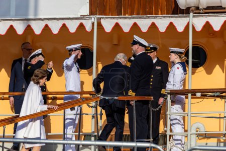 Photo for Stockholm, Sweden May 7, 2024 The Swedish King and Queen arrive at the Danish Royal Yacht Dannebrog in the Stockholm harbour for an official event. - Royalty Free Image