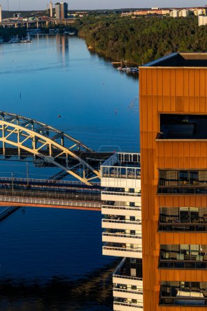 Stockholm, Sweden A view of modern lresidentia buildings in the Liljeholmskajen district and the Arsta bridge