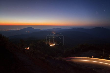 Photo for Silhouette Sunrise over Doi Inthanon National park at Chiang Mai Province, Thailand - Royalty Free Image