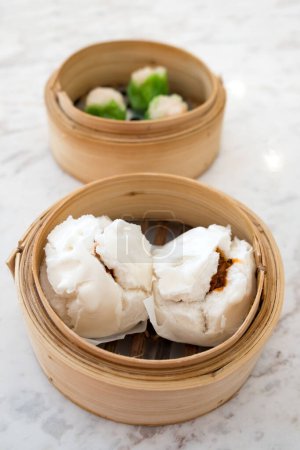 Photo for Char Siu Bao - Chinese steamed bun filled with bbq pork - Royalty Free Image