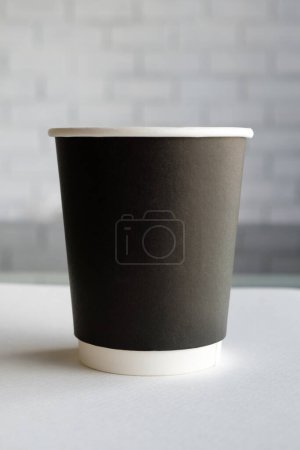 Photo for Take-out coffee with cup holder - Royalty Free Image