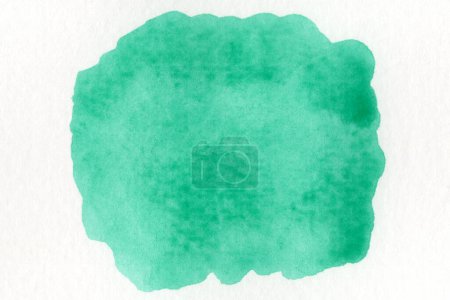 Téléchargez les photos : Aquarelle verte abstraite sur fond blanc.Les éclaboussures de couleur sur le papier.C'est un dessin à la main
. - en image libre de droit