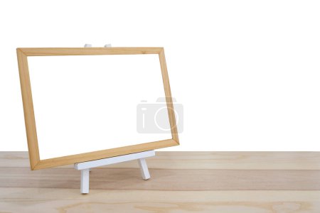 Photo for Wooden frame for photo on wood table - Royalty Free Image