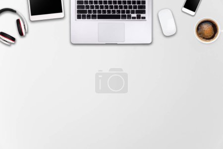 Photo for Modern workspace with laptop tablet, smartphone and coffee cup copy space on wood background. Top view. Flat lay style. - Royalty Free Image