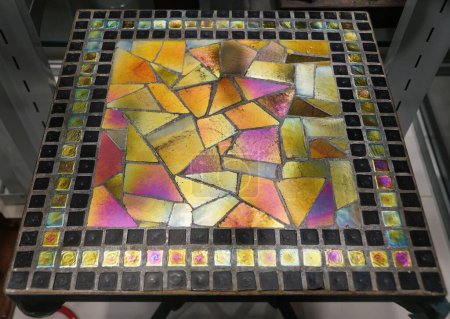 Stunning and colorful mosaic tiles table for indoor decoration