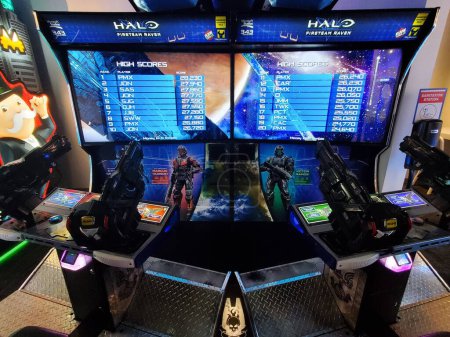 Photo for Nashville, Tennessee, U.S - June 22, 2022 - The double big screen of the Halo Fireteam Raven arcade video game - Royalty Free Image