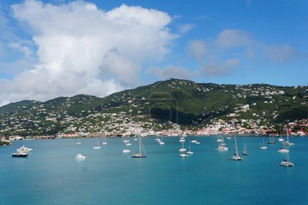 The view of the private yachts and boats on the bay overlooking the town near St Thomas, U.S Virgin Islands