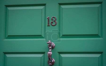 Foto de Number 13 thirteen door of a house in Bristol, England - Imagen libre de derechos