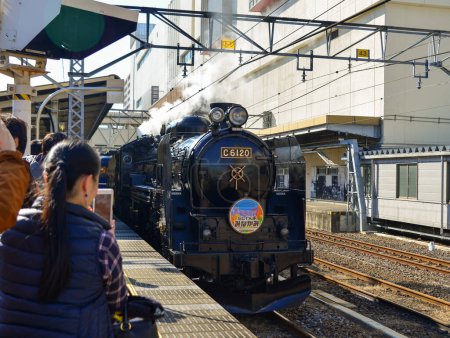 Photo for Gunma, Japan - Nov 9, 2019. A steam train carrying tourists in Gunma, Japan. The railway industry in Japan is culturally and historically significant. - Royalty Free Image