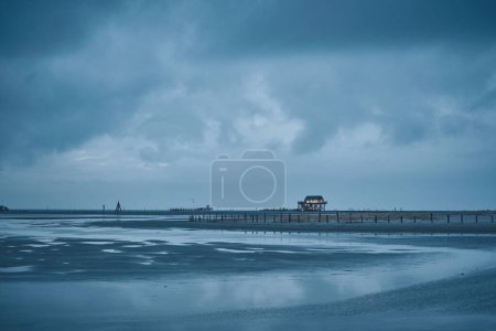 beach of sankt peter-ording germany on overcast day. High quality photo