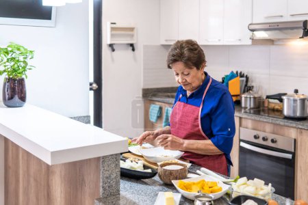 Photo for Granny preparing food. High quality photo - Royalty Free Image