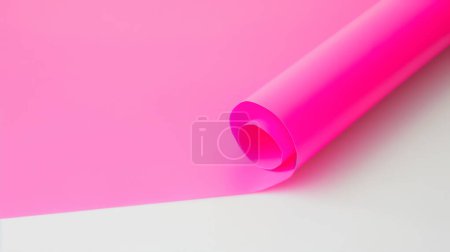 Papel rosa laminado sobre fondo bicolor, creando una composición abstracta minimalista.