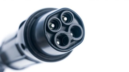 Close-up of a modern electric car charging plug.