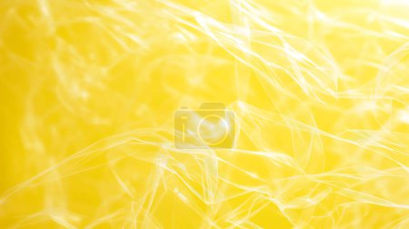 Gossamer textures in glowing yellow hues create an abstract and ethereal visual experience.