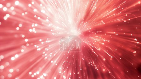 Ein explosiver Ausbruch lebendiger roter Lichtstrahlen, die von einem zentralen Punkt ausgehen, begleitet von funkelnden Teilchen, die eine dynamische und energetische visuelle.