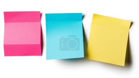 Three colorful sheets of paper in pink, blue, and yellow are partially folded, arranged side by side on a white background.