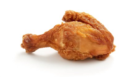 Golden, crispy fried chicken drumstick with a crunchy, textured coating, isolated on a white background, showcasing its deliciously appetizing appearance.