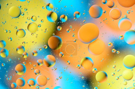 Foto de Manchas azules y anaranjadas con círculos multicolores similares a la galaxia y al microcosmos 21 - Imagen libre de derechos