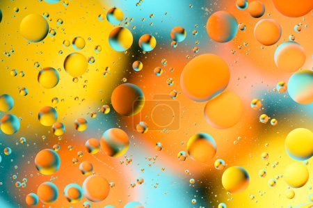 Foto de Manchas azules y anaranjadas con círculos multicolores similares a la galaxia y al microcosmos 1 - Imagen libre de derechos