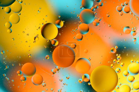 Foto de Manchas azules y anaranjadas con círculos multicolores similares a la galaxia y al microcosmos 4 - Imagen libre de derechos