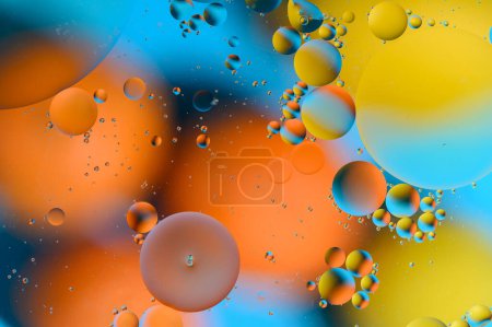 Foto de Manchas azules y anaranjadas con círculos multicolores similares a la galaxia y al microcosmos 9 - Imagen libre de derechos