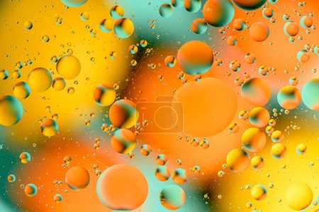 Foto de Manchas azules y anaranjadas con círculos multicolores similares a la galaxia y al microcosmos 19 - Imagen libre de derechos