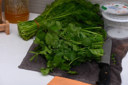Photo for Fresh greens washed on the kitchen table 2 - Royalty Free Image