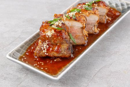 roasted appetizing pork on a stone background studio food photo 11