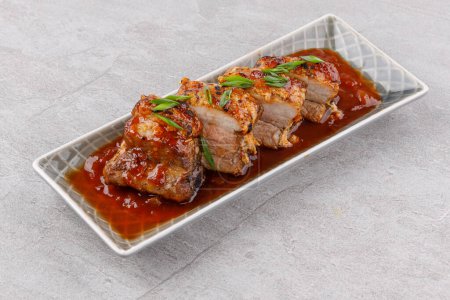 roasted appetizing pork on a stone background studio food photo 3