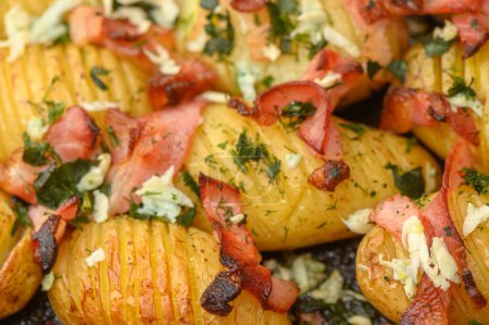 baked potatoes with bacon in the kitchen 10