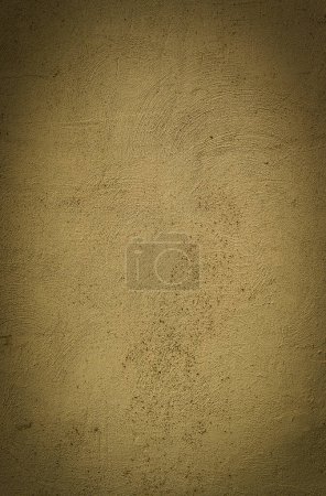 Old stucco plaster yellow painted wall abstract background texture photo 1