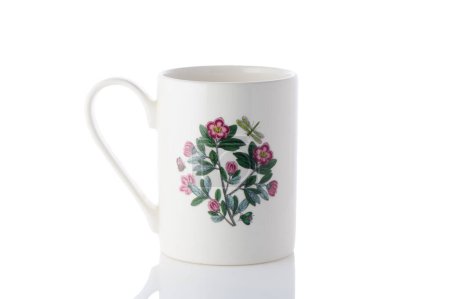 cup with a flower painted on it on a white background. Isolate 3