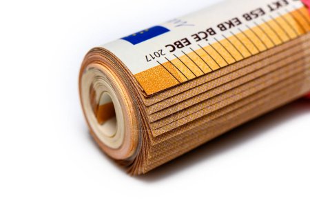 Close-up of a bundle of fifty euro bank notes bound with rubber band
