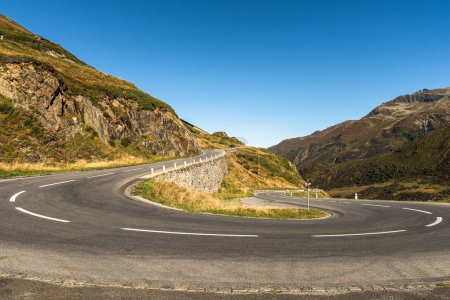 Hairpin bend on empty road at Oberalp Pass, Canton of Graubuenden, Switzerland