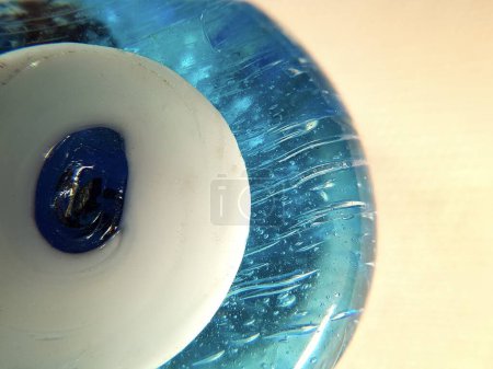 Photo for Close up shot of white blue amulet - Royalty Free Image