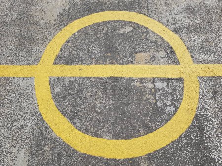 Photo for Yellow midfield painting on the tarmac ground - Royalty Free Image