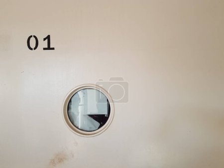 Photo for Circular window and number on ship - Royalty Free Image