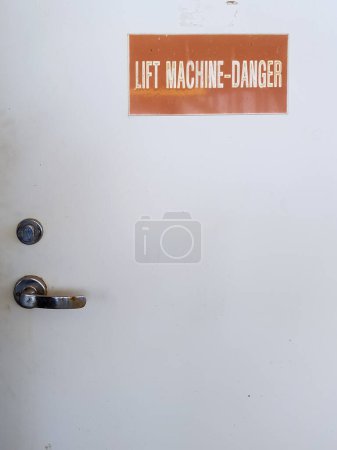 Machinery room entry with the danger sign
